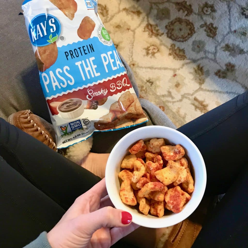 Bowl of Kay’s protein snacks next to an empty bag 